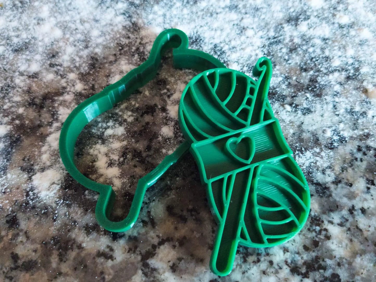 Cookie cutter, ball of yarn